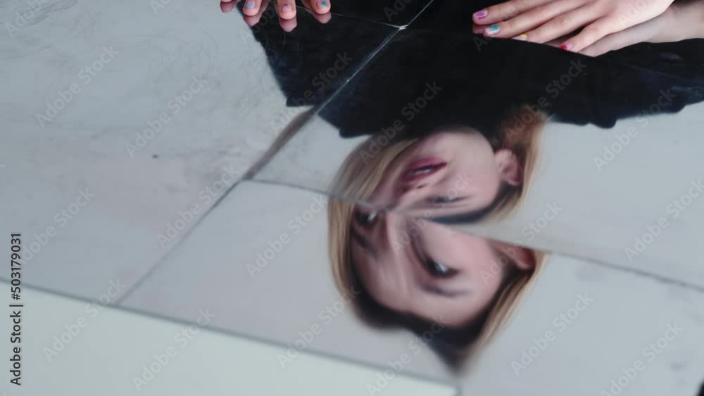 Stress anger. Emotional quarrel. Argument anxiety. Defocused silhouette of frustrated mad dissatisfied woman yelling in scratched distressed broken mirror reflection.