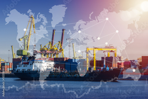 Loading containers on ship. Large container ship in seaport. Concept of supply chains. World map in front of ferry with containers. Marine ship in summer weather. Shore loading cranes