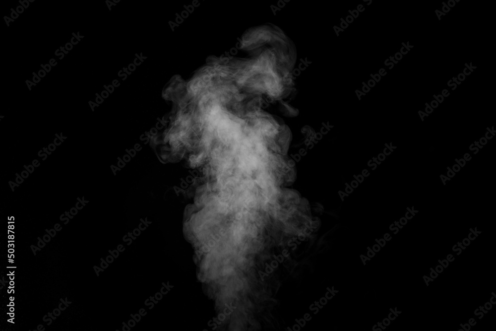 Perfect mystical curly white steam or smoke isolated on black background. Abstract background fog or smog, design element, layout for collages. Perfect mystical curly white steam or smoke isolated on black background. Abstract background fog or smog, design element, layout for collages.