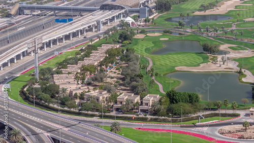 Landscape of green golf course with lakes timelapse. Dubai, UAE