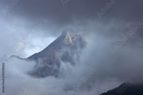 Mountain top shrouded in fog and clouds in the French Pyrenees © aeonWAVE