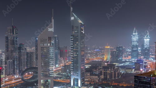 The view on Emirates Towers and Sheikh Zayed road aerial night timelapse
