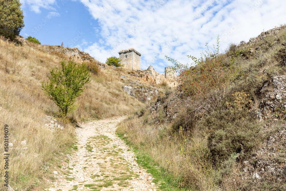 a rural path going from the village to the medieval castle of Ucero, province of Soria, Castile and Leon, Spain