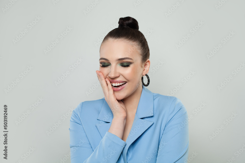 Young cute happy laughing woman brunette studio portrait Young cute happy laughing woman brunette studio portrait