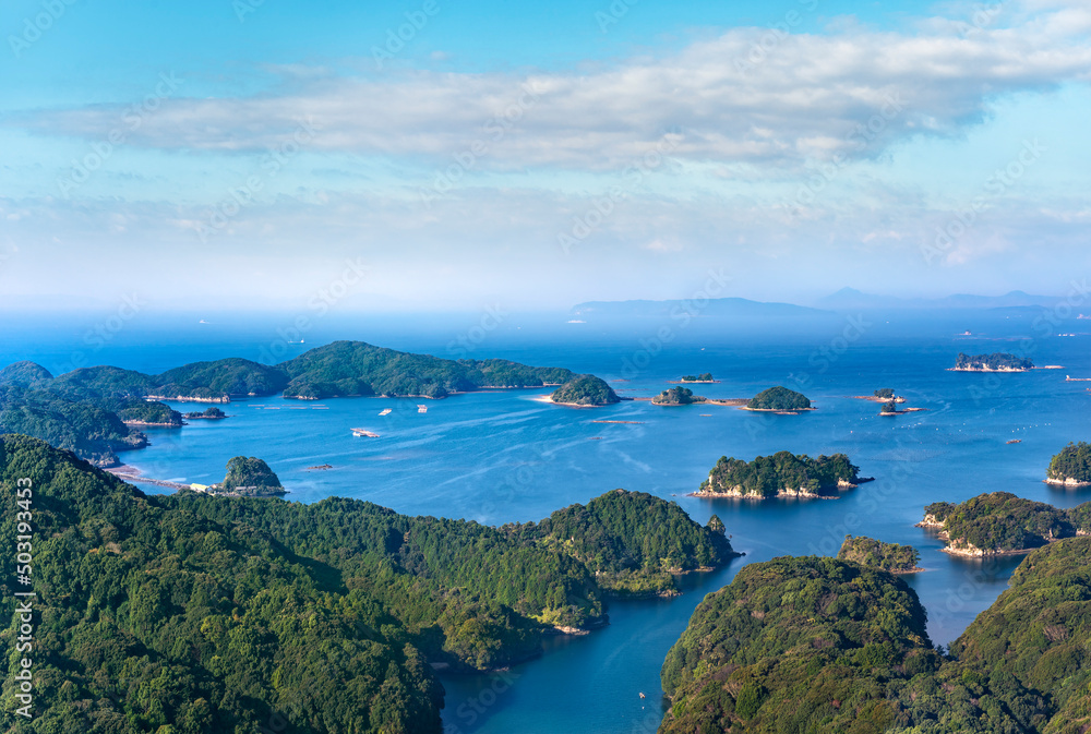 Bird's-eye view of the Kujūkushima seascape with islands that lie off sasebo famous for its saw-toothed coast with multiple islets part of Saikai National Park in Kyushu.