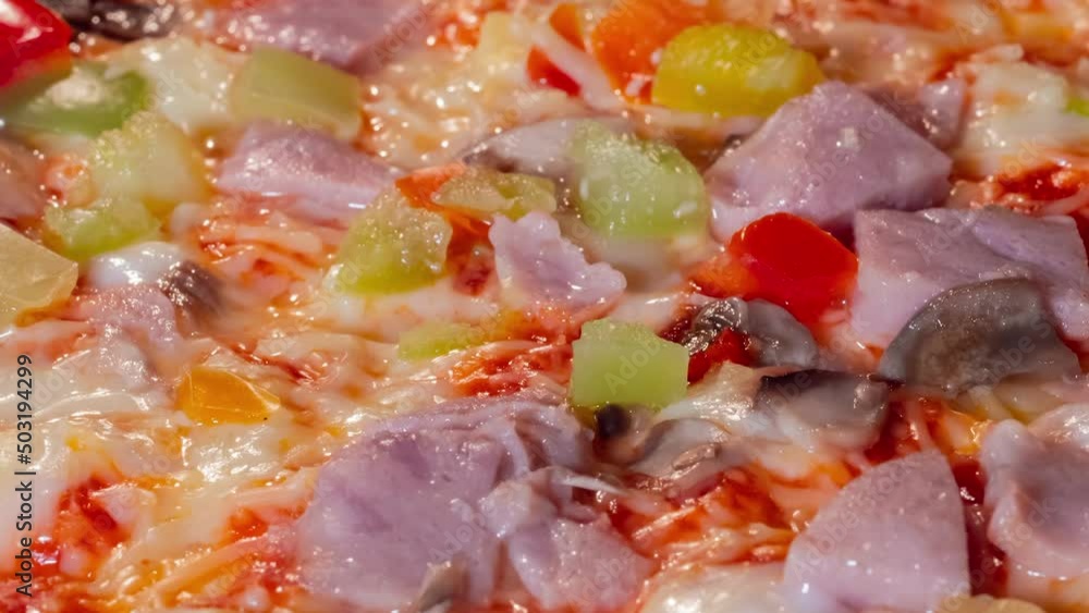 Timelapse - pizza with ham, mushroom, pepper, cheese baking in electric oven - zoom in shot, close up, macro. Italian cuisine, homemade bakery, cooking and time lapse concept Timelapse - pizza with ham, mushroom, pepper, cheese baking in electric oven - zoom in shot, close up, macro. Italian cuisine, homemade bakery, cooking and time lapse concept