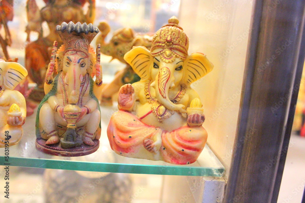 Fototapeta premium Lord Ganesha idol in white marble for sale