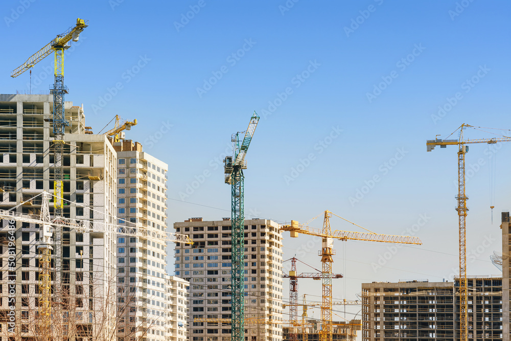 The process of building a residential area in a big city The process of building a residential area in a big city