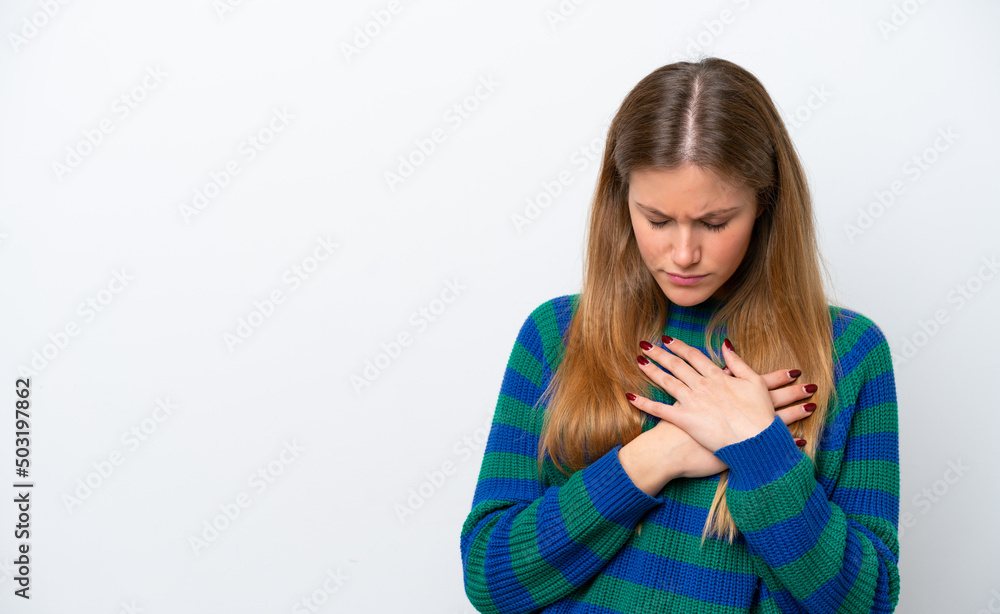 Young caucasian woman isolated on white background having a pain in the heart Young caucasian woman isolated on white background having a pain in the heart