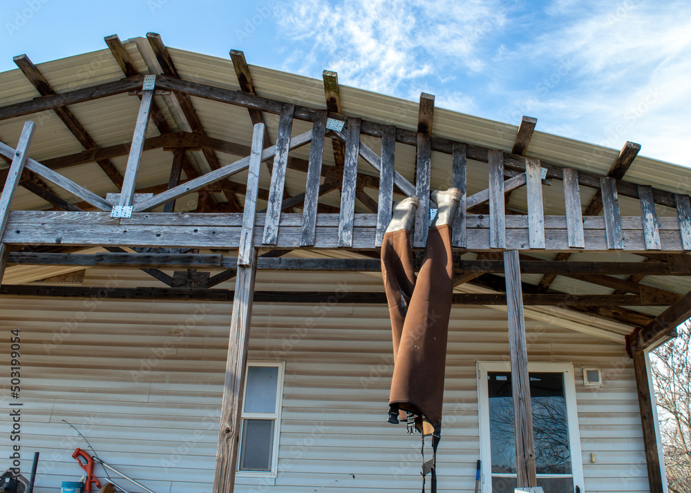 Naklejka premium Drying wader boots from the rafters
