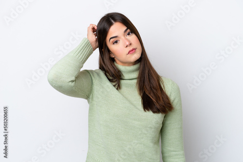 Young Brazilian woman isolated on white background with an expression of frustration and not understanding