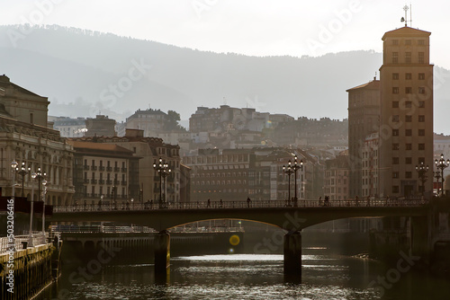 The cityscape of Bilbao, Spain. The Nervion river crosses Bilbao old town. photo