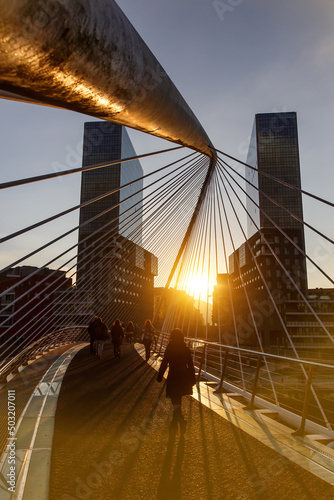 Canvas Print Sunset over Zubizuri bridge in Bilbao, Spain.