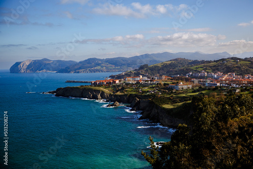 Wallpaper Mural Rocky shore with green meadow, aerial view. Bay of Biscay Coast, Northern Spain. Torontodigital.ca