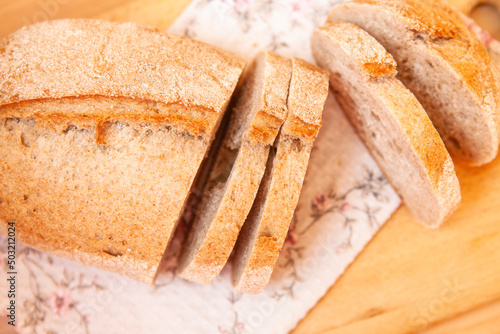 Fresh wholegrain bread on the table, top view