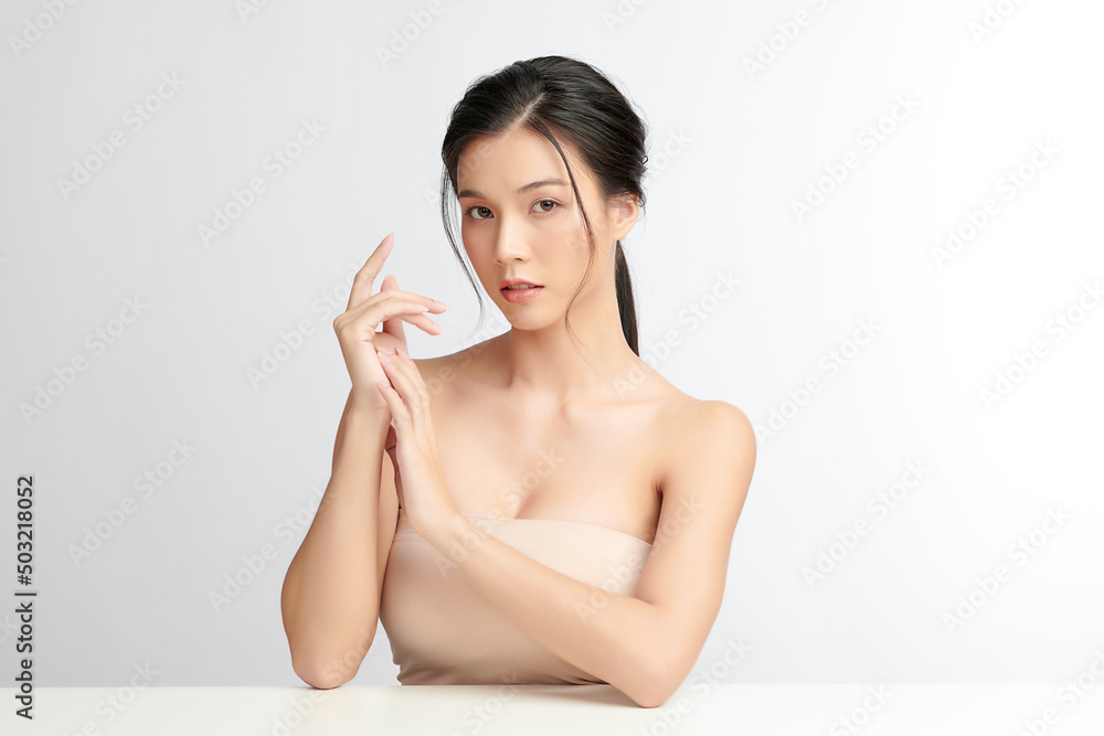 Beautiful young asian woman with clean fresh skin on white background, Face care, Facial treatment, Cosmetology, beauty and spa, Asian women portrait. Beautiful young asian woman with clean fresh skin on white background, Face care, Facial treatment, Cosmetology, beauty and spa, Asian women portrait.