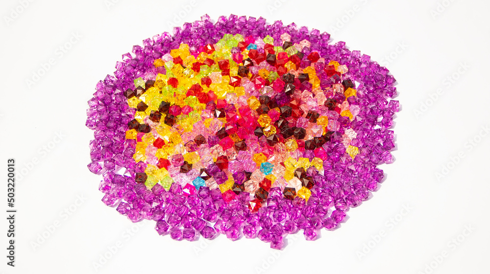 Colorful beads piled up on a white background Colorful beads piled up on a white background