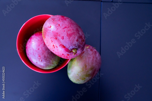 Organic Fresh Red Mangoes ready to eat photo