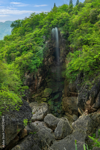 waterfall stream in mountains, high angle