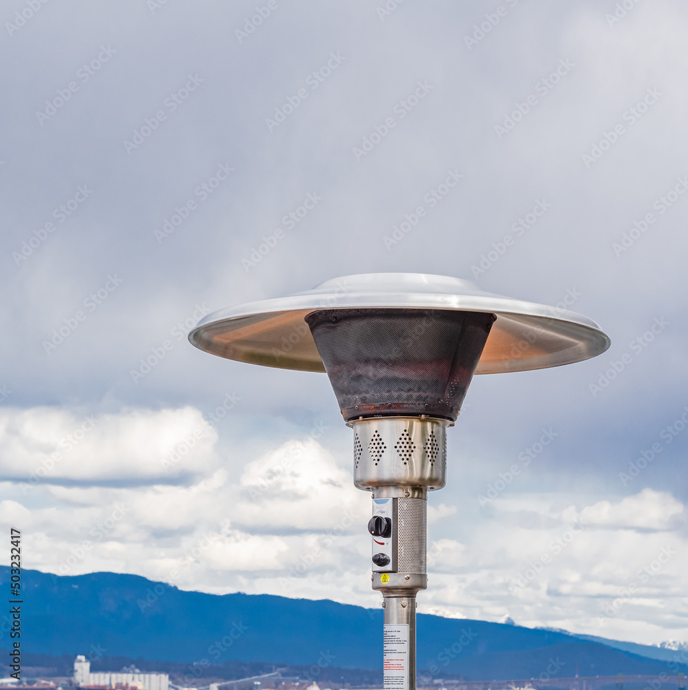 Round Mushroom Propane Patio Heater in outdoor restaurant patio