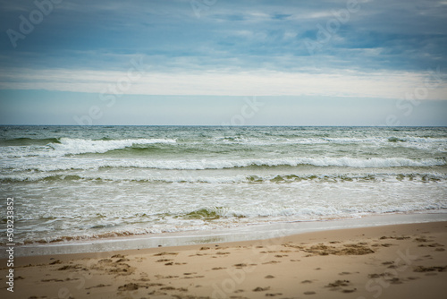 Sea waves in the autumn in Osterlen, Sweden photo