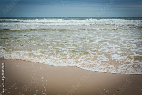 Sea waves in the autumn in Osterlen, Sweden photo