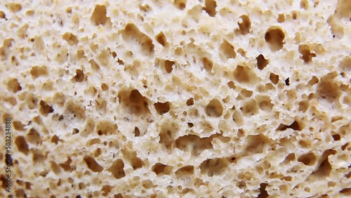 Wallpaper Mural Fresh sliced rye flour bread rotates. Black bread for toast and sandwiches.  Torontodigital.ca