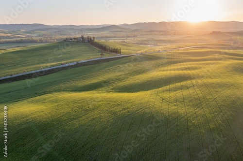 Tuscany hill landscape. Waves hills, rolling hills, minimalistic landscape with green fields in the Tuscany. Val D'orcia in the province of Siena, Italy Beautiful sunny day.