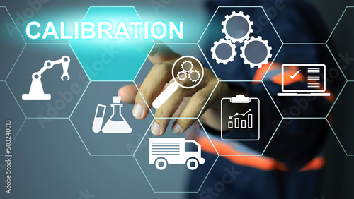 Schilderij op canvas Lab instrumentation engineer or technician pointing to click touch press to activate calibration icon intermediate check or calibration