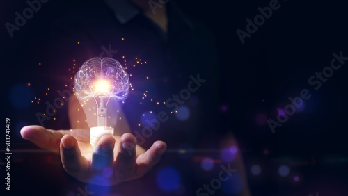 Double exposure Businessman Holding Light Bulbs with Brain Inside, Creative and Innovative Inspiration, Solution Analysis and Development, Innovative Technology.