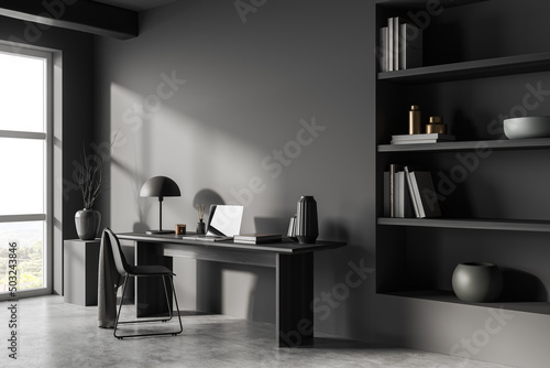 Grey home office interior  seat and table with laptop  shelf and decoration. Mockup