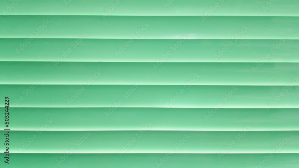 Obraz premium Window Shades Green metal surface