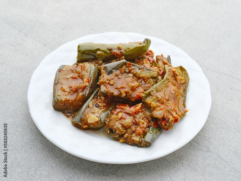 Terong balado, Terong sambal balado or balado eggplant sauce, traditional food from Indonesia. Selective focus image.
Terong balado, Terong sambal balado or balado eggplant sauce, traditional food from Indonesia. Selective focus image.