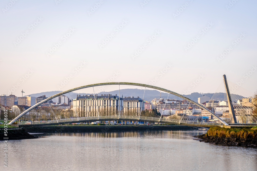 Suspended pedestrian bridge, which crosses the Lerez river in the city of Pontevedra (Spain)
