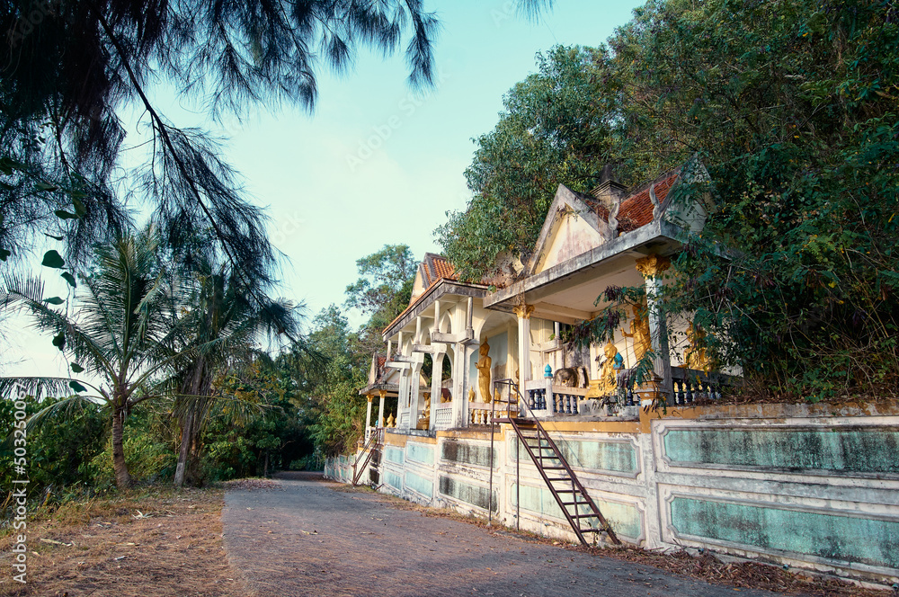 A bit abandoned buddhist temple near a road. Phuket, Thailand. A bit abandoned buddhist temple near a road. Phuket, Thailand.
