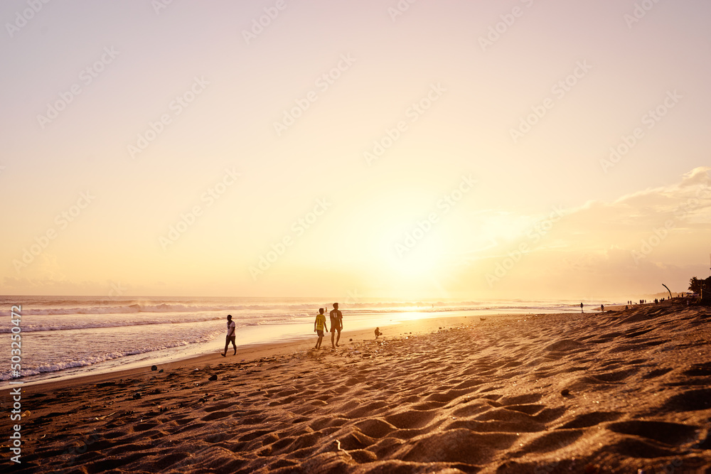 Fototapeta premium Beautiful landscape. Sunset on the sea shore. Bali, Indonesia.