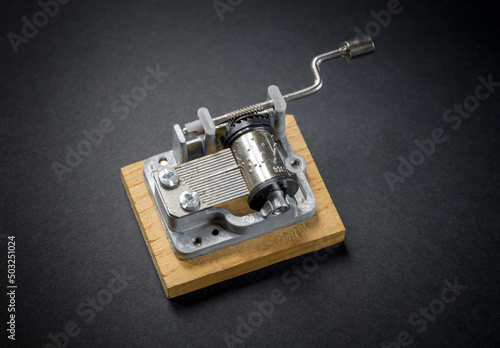 Traditional music box isolated on black