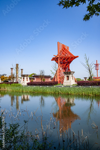 Red special buildings and rivers in Jinshan Park Square of Jinshan Temple in Zhenjiang photo