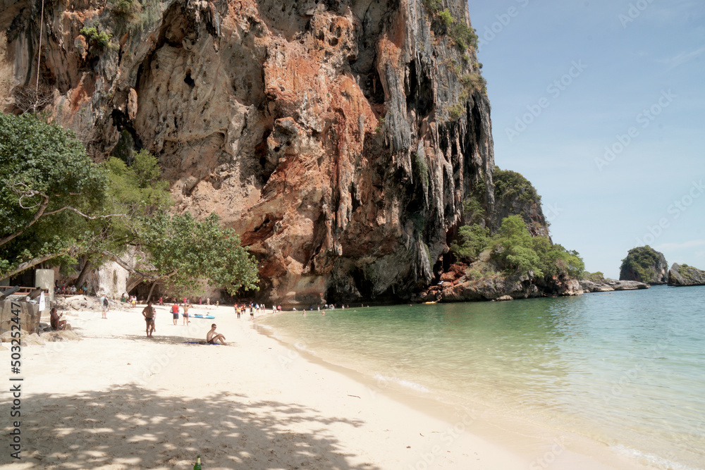 Landscape Railay Phranang Beach  white sand and blue sea with limestone in Railay Ao nang Krabi Thailand - sunny day summer 