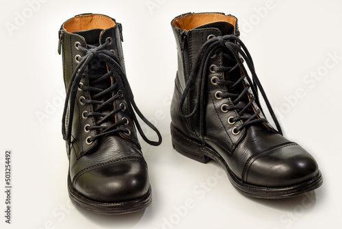 High black man's leather boots. Isolated on a white background.