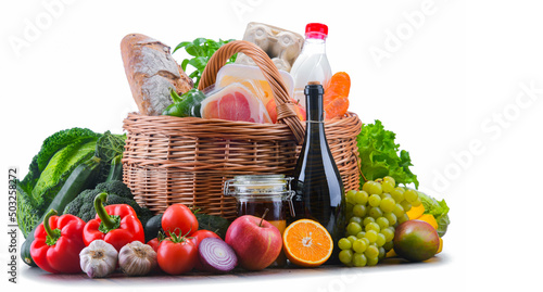 Fototapeta Naklejka Na Ścianę i Meble -  Wicker basket with assorted grocery products