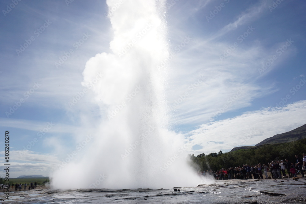 Water exploding in geysir, Iceland. 