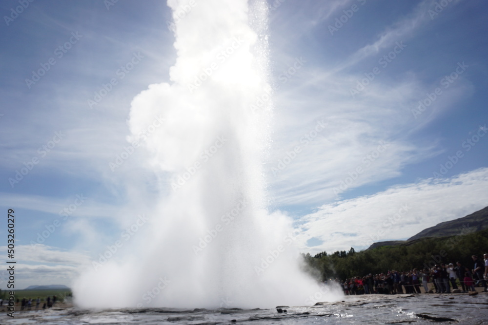 Water exploding in geysir, Iceland. 