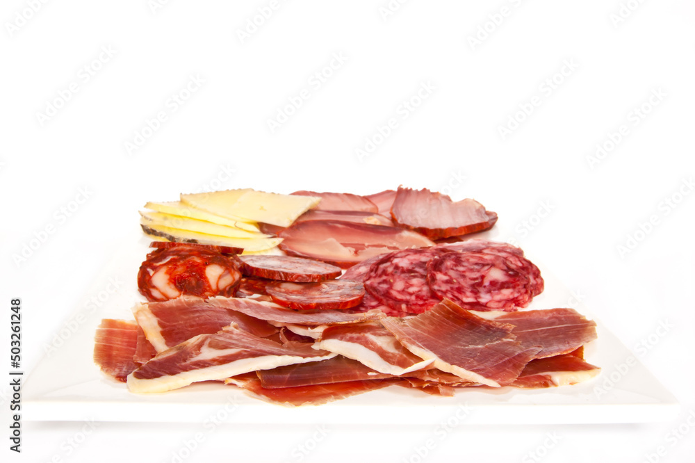 Ration with Spanish ham, sausage, loin and cheese on white background. Ration with Spanish ham, sausage, loin and cheese on white background.