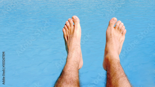 Feet relaxing point of view: in a swimming pool