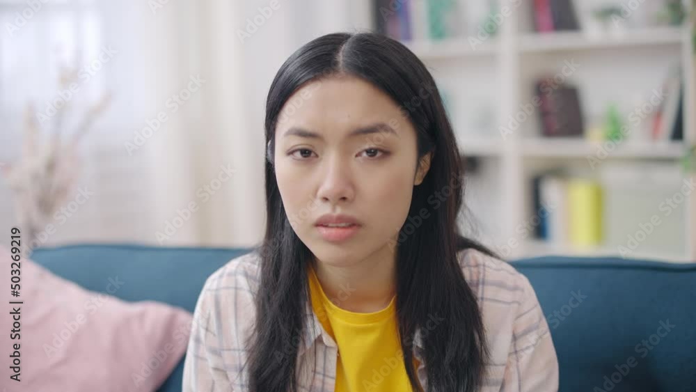 Portrait of young upset woman looking with sadness, having problems, anxiety Portrait of young upset woman looking with sadness, having problems, anxiety