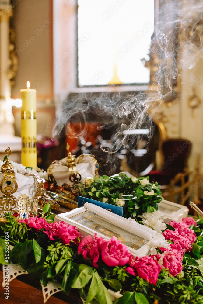 Smoke over the altar of the Church when the priest waves incense.