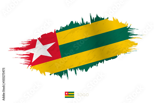 Painted brushstroke flag of Togo with waving effect. photo