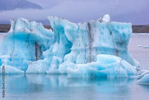 Blue Ice on the shore of the ice lagoon in Iceland