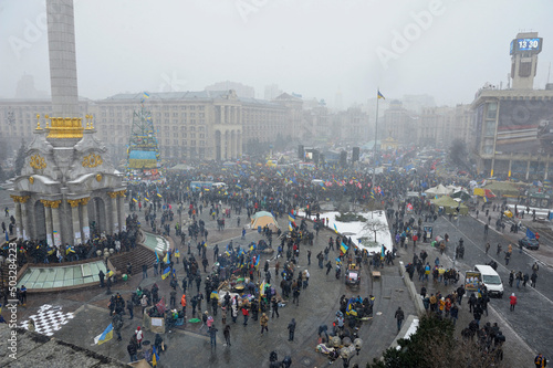 Huge crowd of people gathered on the square, mass demonstration. Revolution of Dignity, Majdan Nezalezhnosti. photo